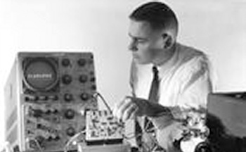 Robert J. Lynch and the IBM scanistor (© IBM Corporation)